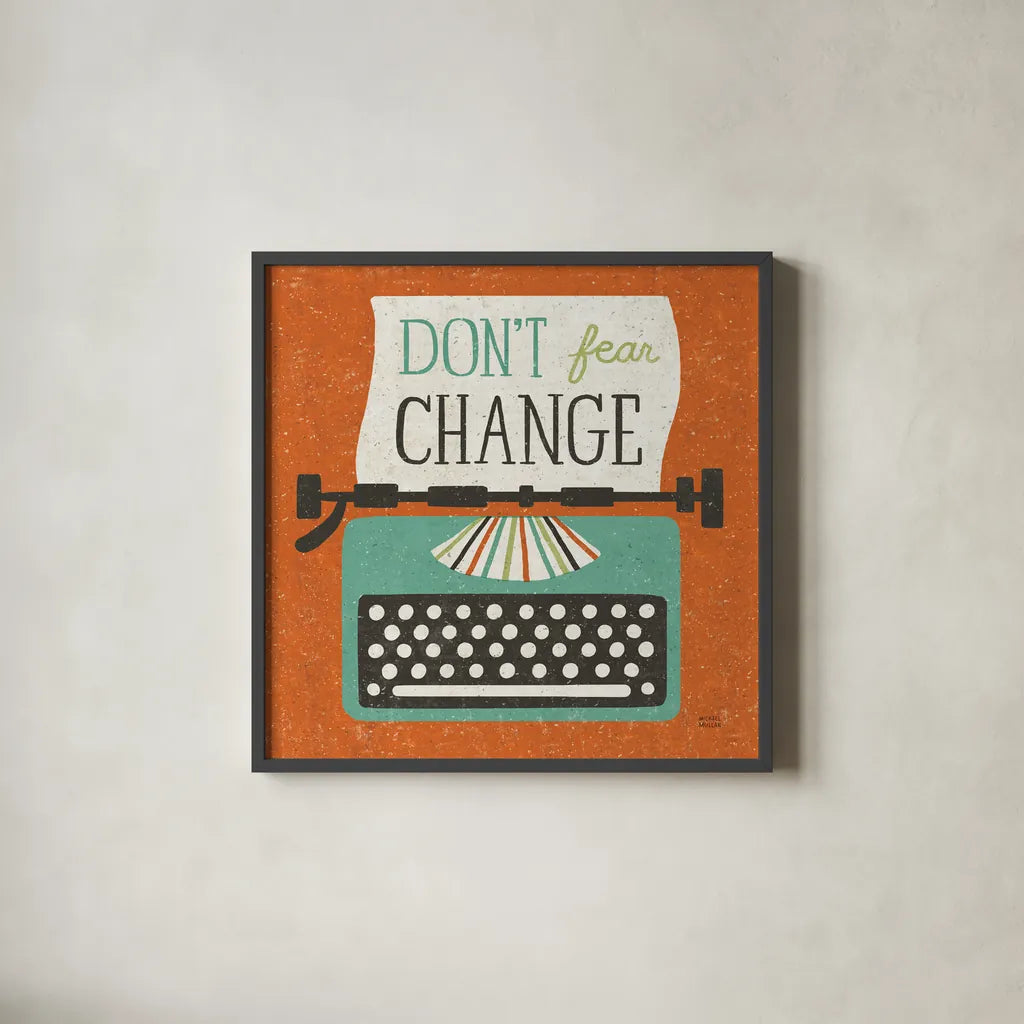 Retro Desktop Typewriter Don't Fear Change by Michael Mullan. Shown in a sleek black glass frame for a contemporary gallery look. Available as an archival giclee rolled canvas, fine art paper, or poster print. SKU 65001a.
