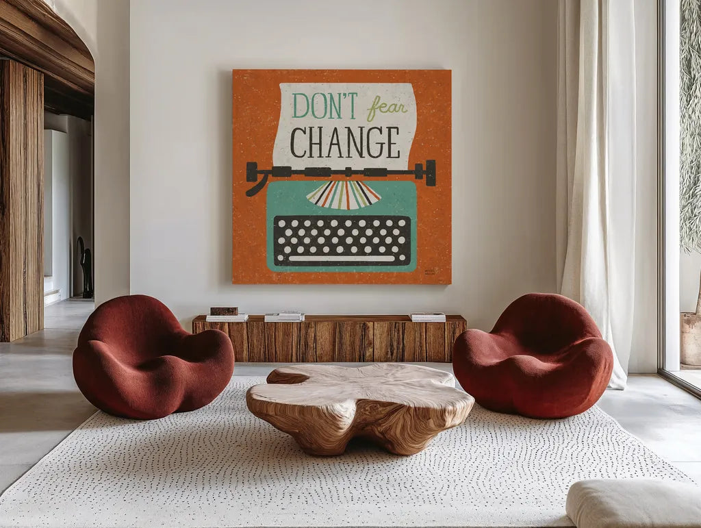 Retro Desktop Typewriter Don't Fear Change by Michael Mullan. Shown as extra-large giant wall art in a modern living room. Available as an archival giclee rolled canvas, fine art paper, or poster print. SKU 65001a.