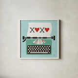 Retro Desktop Typewriter Love by Michael Mullan. Shown in a crisp white glass frame for a clean and minimalist style. Available as an archival giclee rolled canvas, fine art paper, or poster print. SKU 51372a.