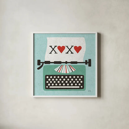 Retro Desktop Typewriter Love by Michael Mullan. Shown in a crisp white glass frame for a clean and minimalist style. Available as an archival giclee rolled canvas, fine art paper, or poster print. SKU 51372a.