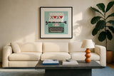 Retro Desktop Typewriter Love by Michael Mullan. Displayed in a glass frame with matte in a clean modern living room. Available as an archival giclee rolled canvas, fine art paper, or poster print. SKU 51372a.