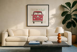 Road Trip Bus by Michael Mullan. Displayed in a glass frame with matte in a clean modern living room. Available as an archival giclee rolled canvas, fine art paper, or poster print. SKU 17671a.