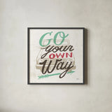 Road Trip Go Your Own Way by Michael Mullan. Shown in a sleek black glass frame for a contemporary gallery look. Available as an archival giclee rolled canvas, fine art paper, or poster print. SKU 19883a.