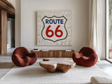 Road Trip Route 66 Navy Red by Michael Mullan. Shown as extra-large giant wall art in a modern living room. Available as an archival giclee rolled canvas, fine art paper, or poster print. SKU 32582a.