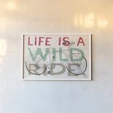 Road Trip Wild Ride by Michael Mullan. shown as a paper print in a white frame. Available as a archival giclee rolled canvas, fine art paper, or poster print. SKU 19820i.