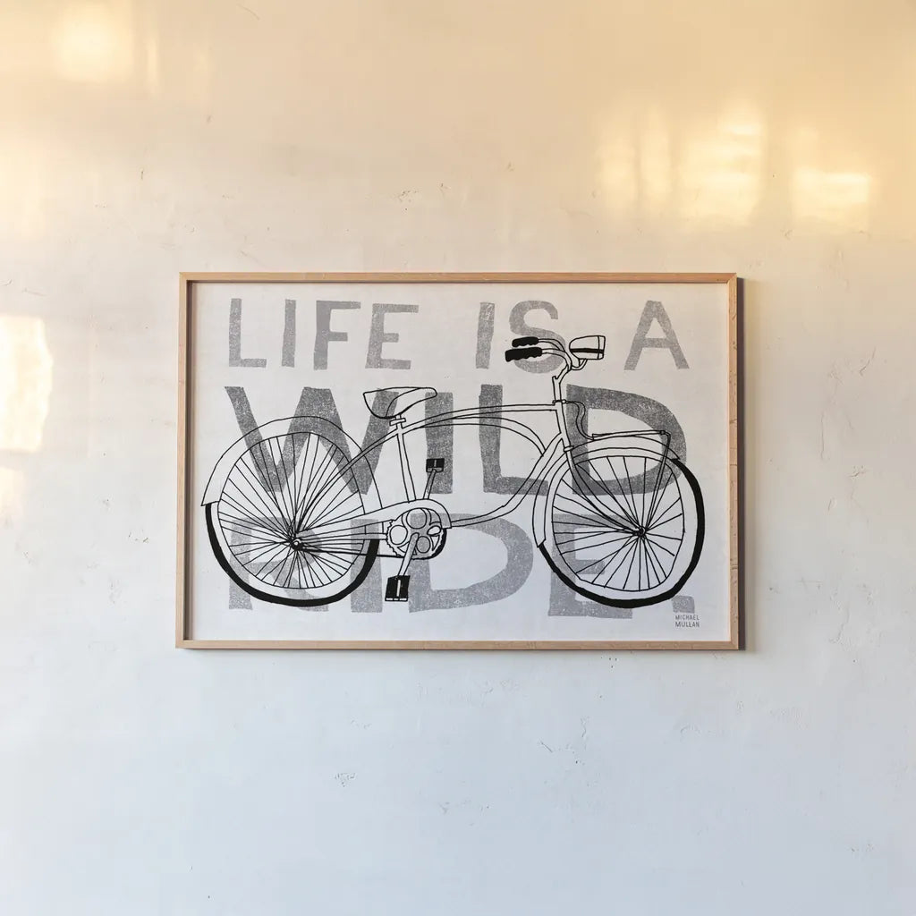 Road Trip Wild Ride BW by Michael Mullan. shown as a paper print in a natural frame. Available as a archival giclee rolled canvas, fine art paper, or poster print. SKU 32586i.