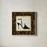 Safari Shoes II by Michael Mullan. Shown in a natural wood glass frame for a timeless modern aesthetic. Available as an archival giclee rolled canvas, fine art paper, or poster print. SKU 2865a.