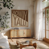 Southern Pride Sayings Howdy Yall Tan by Michael Mullan. Shown in a natural wood frame in a cozy modern living room. Available as an archival giclee rolled canvas, fine art paper, or poster print. SKU 88699a.