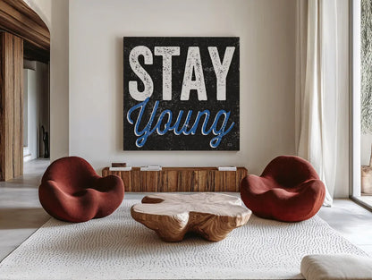 Stay Young by Michael Mullan. Shown as extra-large giant wall art in a modern living room. Available as an archival giclee rolled canvas, fine art paper, or poster print. SKU 13852a.