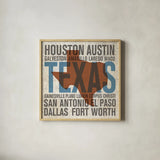 Texas v2 by Michael Mullan. Shown in a natural wood glass frame for a timeless modern aesthetic. Available as an archival giclee rolled canvas, fine art paper, or poster print. SKU 18074a.