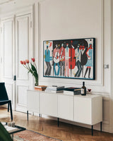The Band by Michael Mullan. shown as a framed stretched canvas in a living room above a console. Available as a archival giclee rolled canvas, fine art paper, or poster print. SKU 14581i.
