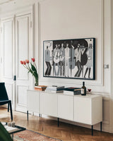 The Band BW by Michael Mullan. shown as a framed stretched canvas in a living room above a console. Available as a archival giclee rolled canvas, fine art paper, or poster print. SKU 51116i.