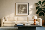 Type Sax Neutral Square by Michael Mullan. Displayed in a glass frame with matte in a clean modern living room. Available as an archival giclee rolled canvas, fine art paper, or poster print. SKU 51038a.