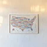 US City Map by Michael Mullan. shown as a paper print in a white frame. Available as a archival giclee rolled canvas, fine art paper, or poster print. SKU 18273i.