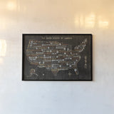US City Map Black by Michael Mullan. shown as a paper print in a black flame. Available as a archival giclee rolled canvas, fine art paper, or poster print. SKU 20462i.