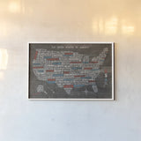 US City Map on Wood Gray by Michael Mullan. shown as a paper print in a white frame. Available as a archival giclee rolled canvas, fine art paper, or poster print. SKU 21210i.