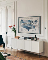 USA Modern Vintage Blue Grey with Words by Michael Mullan. shown as a framed stretched canvas in a living room above a console. Available as a archival giclee rolled canvas, fine art paper, or poster print. SKU 25367i.