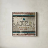 Vintage Bakery Sign by Michael Mullan. Shown in a crisp white glass frame for a clean and minimalist style. Available as an archival giclee rolled canvas, fine art paper, or poster print. SKU 51286a.