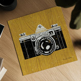 Vintage Camera on Wood by Michael Mullan. Shown as a detailed flat fine art print, highlighting archival giclee quality. Available as an archival giclee rolled canvas, fine art paper, or poster print. SKU 50707a.