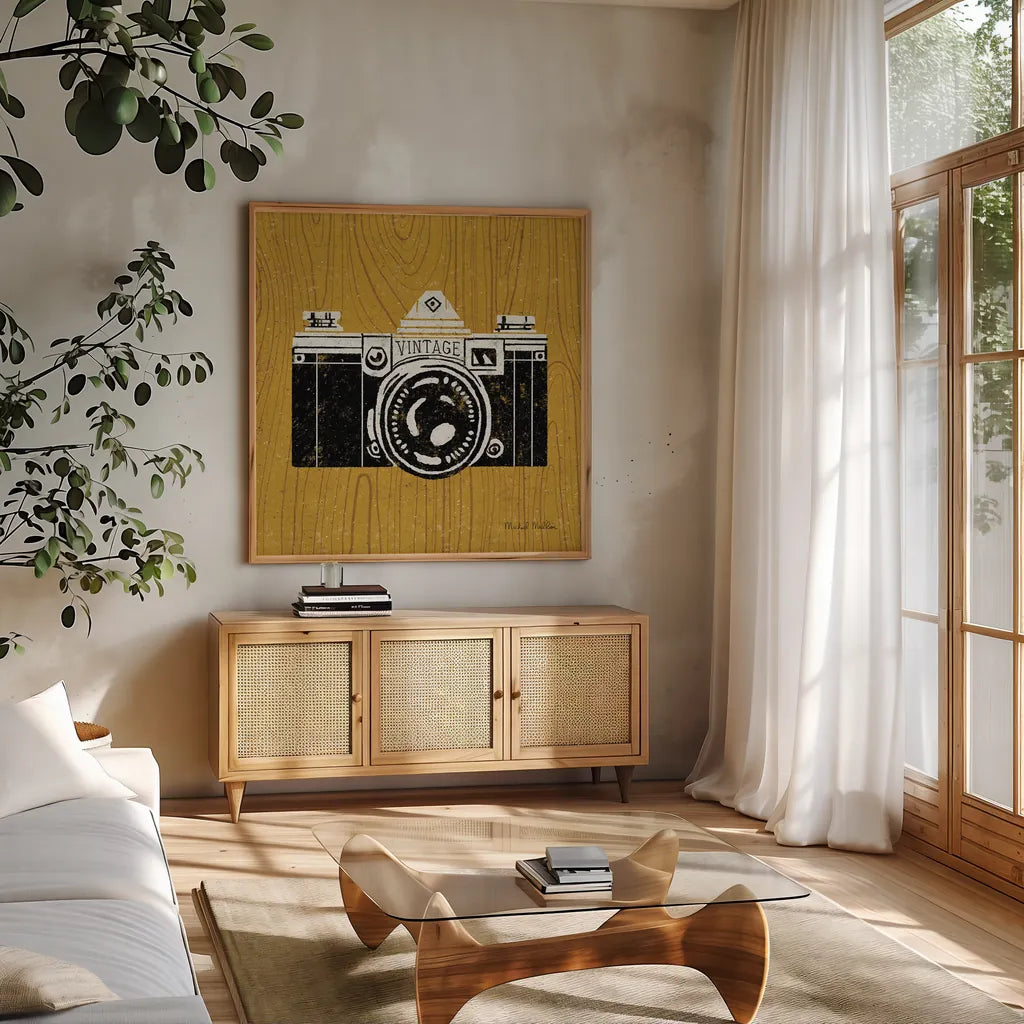 Vintage Camera on Wood by Michael Mullan. Shown in a natural wood frame in a cozy modern living room. Available as an archival giclee rolled canvas, fine art paper, or poster print. SKU 50707a.