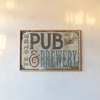 Vintage Pub Brewery Sign by Michael Mullan. shown as a paper print in a natural frame. Available as a archival giclee rolled canvas, fine art paper, or poster print. SKU 51290i.