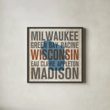 Wisconsin by Michael Mullan. Shown in a sleek black glass frame for a contemporary gallery look. Available as an archival giclee rolled canvas, fine art paper, or poster print. SKU 18076a.