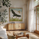 Woodland Dweller Eagle by Michael Mullan. Shown in a natural wood frame in a cozy modern living room. Available as an archival giclee rolled canvas, fine art paper, or poster print. SKU 41748a.