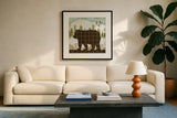 Woodland Dwellers Bear Plaid Light by Michael Mullan. Displayed in a glass frame with matte in a clean modern living room. Available as an archival giclee rolled canvas, fine art paper, or poster print. SKU 41746a.