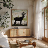 Woodland Dwellers Black Deer I Dots by Michael Mullan. Shown in a natural wood frame in a cozy modern living room. Available as an archival giclee rolled canvas, fine art paper, or poster print. SKU 50491a.