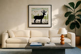 Woodland Dwellers Black Deer I Dots by Michael Mullan. Displayed in a glass frame with matte in a clean modern living room. Available as an archival giclee rolled canvas, fine art paper, or poster print. SKU 50491a.