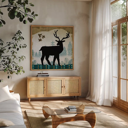 Woodland Dwellers Black Deer II by Michael Mullan. Shown in a natural wood frame in a cozy modern living room. Available as an archival giclee rolled canvas, fine art paper, or poster print. SKU 50492a.