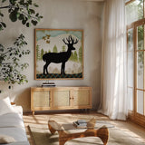 Woodland Dwellers Black Deer III by Michael Mullan. Shown in a natural wood frame in a cozy modern living room. Available as an archival giclee rolled canvas, fine art paper, or poster print. SKU 50493a.