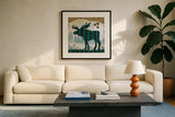 Woodland Dwellers Moose by Michael Mullan. Displayed in a glass frame with matte in a clean modern living room. Available as an archival giclee rolled canvas, fine art paper, or poster print. SKU 41749a.