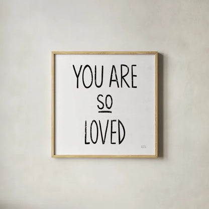 You Are So Loved Sq BW by Michael Mullan. Shown in a natural wood glass frame for a timeless modern aesthetic. Available as an archival giclee rolled canvas, fine art paper, or poster print. SKU 54659a.