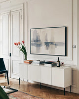 Improvisation II Navy by Mike Schick. shown as a framed stretched canvas in a living room above a console. Available as a archival giclee rolled canvas, fine art paper, or poster print. SKU 48102i.