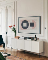 Laterally Speaking Pink by Mike Schick. shown as a framed stretched canvas in a living room above a console. Available as a archival giclee rolled canvas, fine art paper, or poster print. SKU 53251i.
