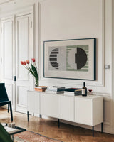Latitude Sage by Mike Schick. shown as a framed stretched canvas in a living room above a console. Available as a archival giclee rolled canvas, fine art paper, or poster print. SKU 66723i.