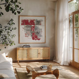 Moving In and Out of Traffic II Red Grey by Mike Schick. Shown in a natural wood frame in a cozy modern living room. Available as an archival giclee rolled canvas, fine art paper, or poster print. SKU 33762a.