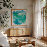 Sea Glass by Mike Schick. Shown in a natural wood frame in a cozy modern living room. Available as an archival giclee rolled canvas, fine art paper, or poster print. SKU 18240a.