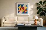 Triangles I Bright Primary by Mike Schick. Displayed in a glass frame with matte in a clean modern living room. Available as an archival giclee rolled canvas, fine art paper, or poster print. SKU 82310a.