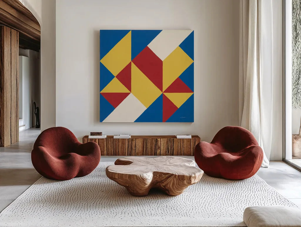 Triangles I Bright Primary by Mike Schick. Shown as extra-large giant wall art in a modern living room. Available as an archival giclee rolled canvas, fine art paper, or poster print. SKU 82310a.