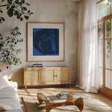 Weaving I by Mike Schick. Shown in a natural wood frame in a cozy modern living room. Available as an archival giclee rolled canvas, fine art paper, or poster print. SKU 59965a.