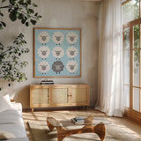 Be Ewe by Moira Hershey. Shown in a natural wood frame in a cozy modern living room. Available as an archival giclee rolled canvas, fine art paper, or poster print. SKU 59590a.