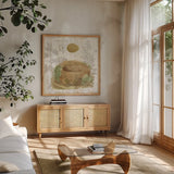 Botanical Nest IV by Moira Hershey. Shown in a natural wood frame in a cozy modern living room. Available as an archival giclee rolled canvas, fine art paper, or poster print. SKU 8386a.