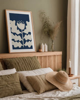 Delighted I Navy Vertical by Moira Hershey. shown as a paper print in a natural frame. Available as a archival giclee rolled canvas, fine art paper, or poster print. SKU 80735h.