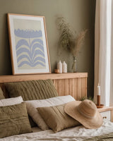Delighted III Lavender Vertical by Moira Hershey. shown as a paper print in a natural frame. Available as a archival giclee rolled canvas, fine art paper, or poster print. SKU 80733h.