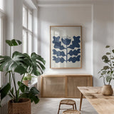 Delighted IV Navy Vertical by Moira Hershey. shown as a print in a natural wood frame in a dining room. Available as a archival giclee rolled canvas, fine art paper, or poster print. SKU 80738h.