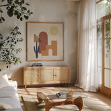 Desert Arches II Sq by Moira Hershey. Shown in a natural wood frame in a cozy modern living room. Available as an archival giclee rolled canvas, fine art paper, or poster print. SKU 80641a.