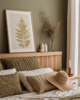 Fern Print I Gold No Shiplap by Moira Hershey. shown as a paper print in a natural frame. Available as a archival giclee rolled canvas, fine art paper, or poster print. SKU 57690h.