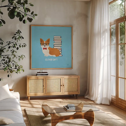 Good Dogs Corgi Bright by Moira Hershey. Shown in a natural wood frame in a cozy modern living room. Available as an archival giclee rolled canvas, fine art paper, or poster print. SKU 21628a.